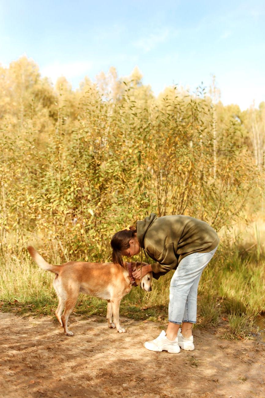Harper with her Golden Retriever